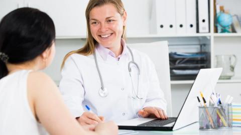 Woman visiting female doctor
