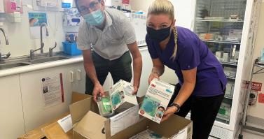 Dr Konrad Kangru (left) and a Whitsunday Doctors Service nurse receives PPE