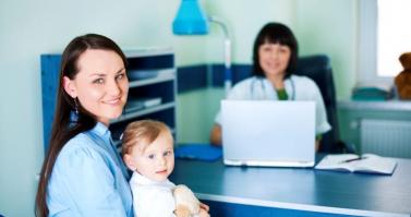 Mother and her daughter with a pediatrician