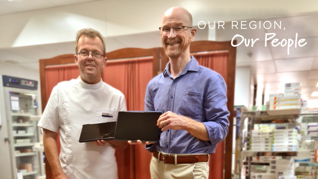 Pharmacist Stephen Hall and David Griffiths (right) from Griffiths Pharmacy in Charter Towers with new iPads