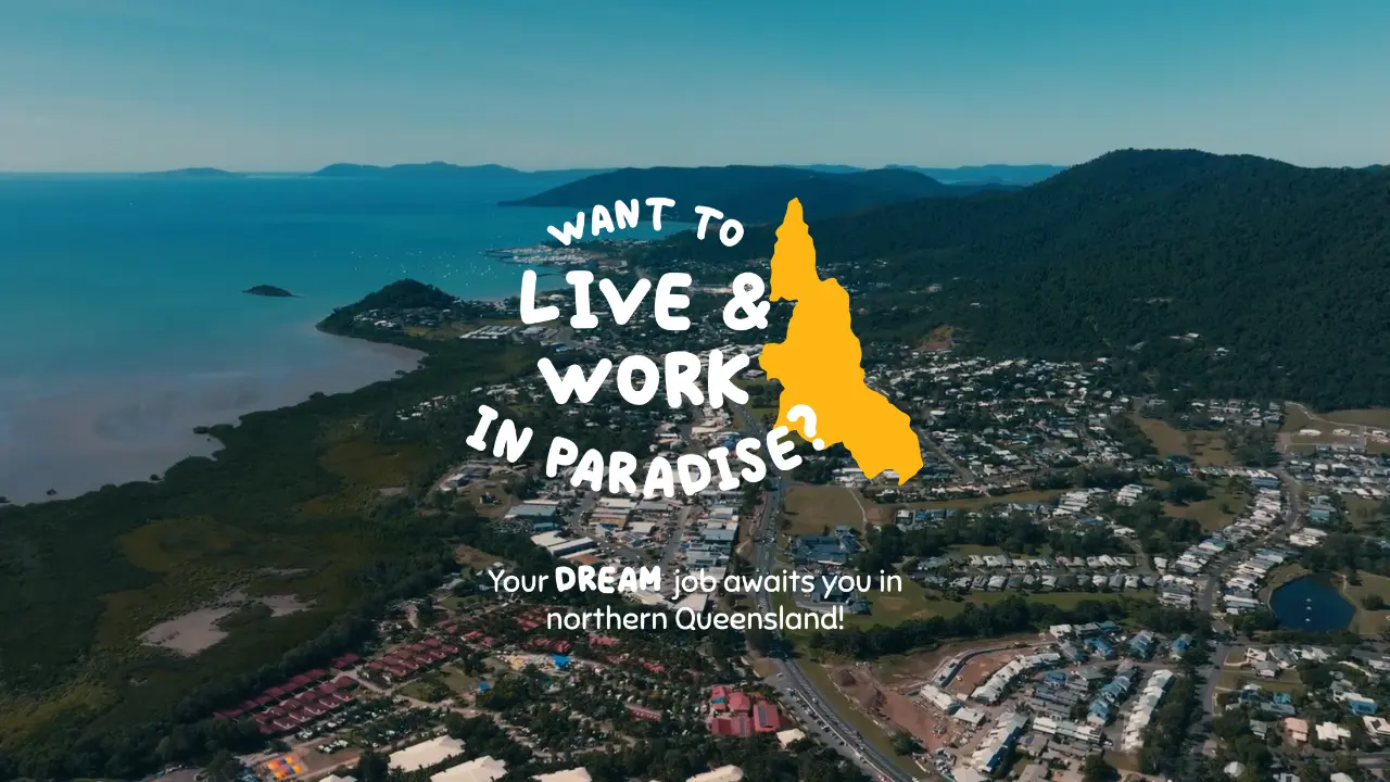 Live and work in paradise logo on top of an image of Airlie beach